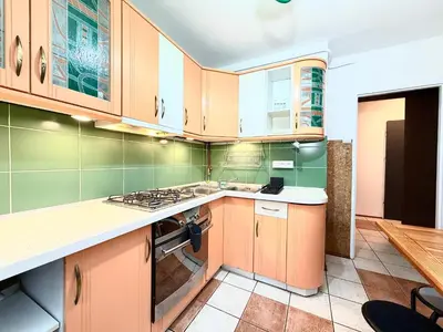 Kuchnia lub aneks kuchenny w obiekcie Kilińskiego Urban Apartment by BookingHost