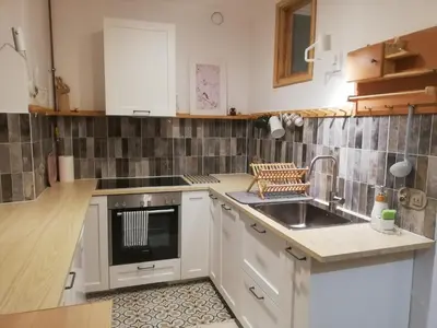 Kuchnia lub aneks kuchenny w obiekcie Apartamenty Mirabelka
