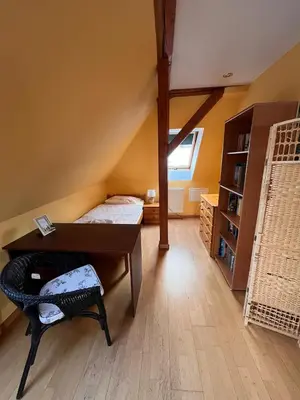Łóżko lub łóżka w pokoju w obiekcie Apartament Parkowy
