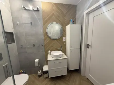 Łazienka w obiekcie Apartament Przy Palmiarni