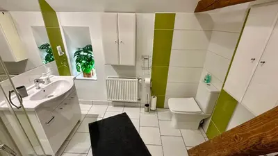 Łazienka w obiekcie Atrakcyjny apartament z widokiem - Góry Sowie - Bielawa