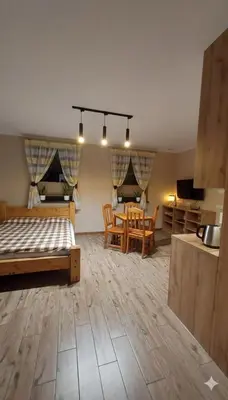 Łóżko lub łóżka w pokoju w obiekcie Apartament u Hillów