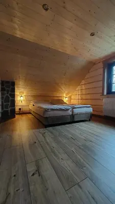 Łóżko lub łóżka w pokoju w obiekcie Domek u Hillów
