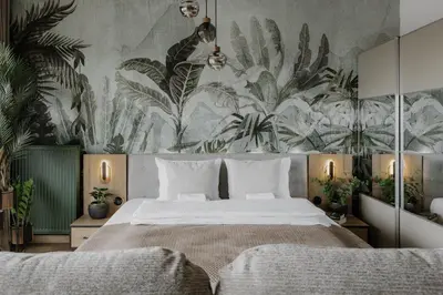 Łóżko lub łóżka w pokoju w obiekcie Mieszczańska 24 Urban Floral Studio Wrocław Fair Rentals