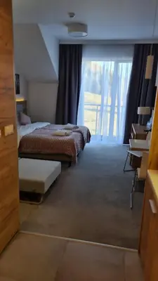 Łóżko lub łóżka w pokoju w obiekcie Apathotel Apartamety Czarna Góra 236