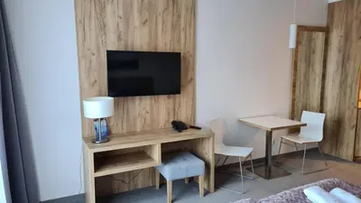 Telewizja i/lub zestaw kina domowego w obiekcie Aparthotel Apartamenty Czarna Góra 0119