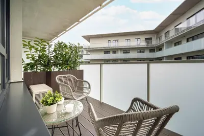 Balkon lub taras w obiekcie Elegant Apartments Mieszczańska Wrocław with Air Conditioning, Spa & Gym by Renters Prestige