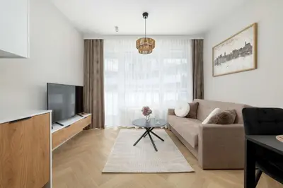 Telewizja i/lub zestaw kina domowego w obiekcie Elegant Apartments Mieszczańska Wrocław with Air Conditioning, Spa & Gym by Renters Prestige