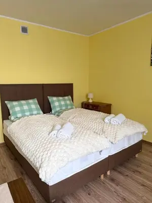 Łóżko lub łóżka w pokoju w obiekcie Apartament Salamandra Due