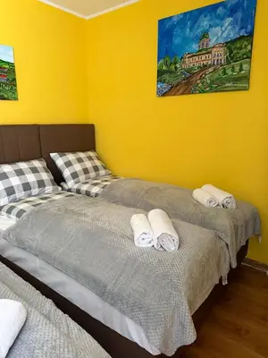 Łóżko lub łóżka w pokoju w obiekcie Apartament Salamandra Due