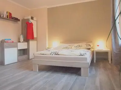 Łóżko lub łóżka w pokoju w obiekcie Villa 106