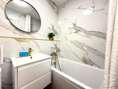 Łazienka w obiekcie Powstańców Śląskich Lavish Apartment by BookingHost