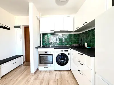 Kuchnia lub aneks kuchenny w obiekcie Powstańców Śląskich Lavish Apartment by BookingHost