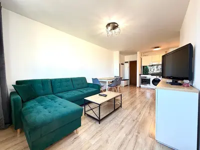 Telewizja i/lub zestaw kina domowego w obiekcie Powstańców Śląskich Lavish Apartment by BookingHost