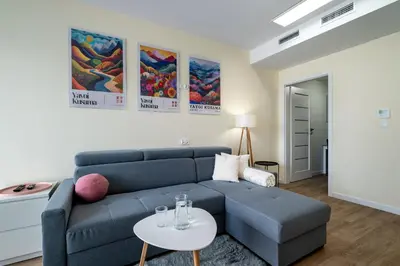 Część wypoczynkowa w obiekcie RentPlanet - Apartament Brzoskwiniowa