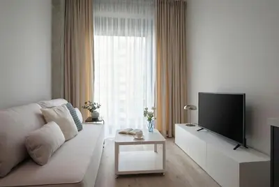 Telewizja i/lub zestaw kina domowego w obiekcie Aparthotel Symphony Krakowska 35
