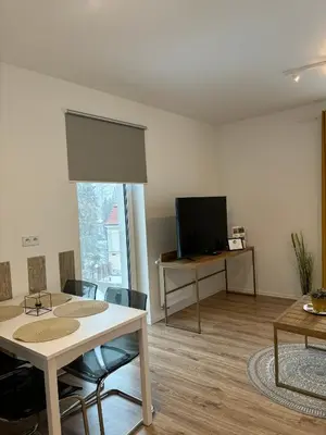 Telewizja i/lub zestaw kina domowego w obiekcie Apartament Bursztynowy
