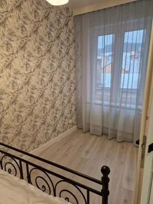 Łóżko lub łóżka w pokoju w obiekcie Noclegi u Moniki