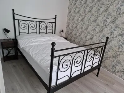 Łóżko lub łóżka w pokoju w obiekcie Noclegi u Moniki