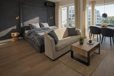 Łóżko lub łóżka w pokoju w obiekcie Riverside Luxury Studio Old Town Wroclaw WIFI