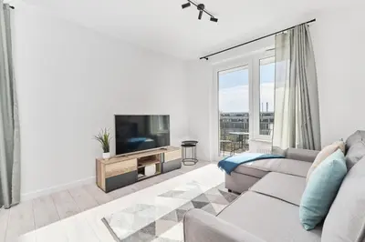 Telewizja i/lub zestaw kina domowego w obiekcie Siemianowicka Apartment with Balcony & Parking Wrocław by Noclegi Renters