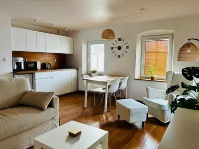 Część wypoczynkowa w obiekcie Słoneczny apartament z sauną
