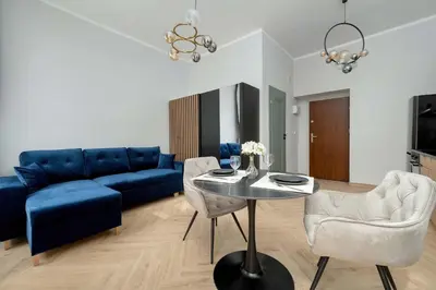 Telewizja i/lub zestaw kina domowego w obiekcie Dąbrowskiego Wrocław Climate Studio Pet Friendly by Noclegi Renters