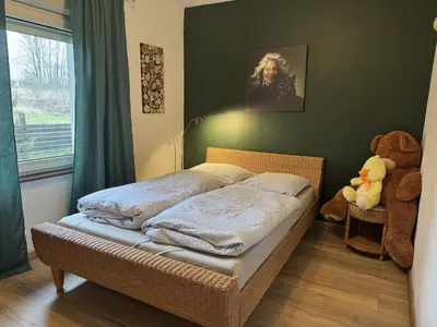 Łóżko lub łóżka w pokoju w obiekcie Polanica Zdrój dom wolnostojący dla 6 osób