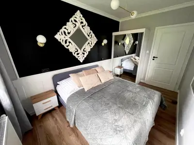 Łóżko lub łóżka w pokoju w obiekcie Apartament Między Szczytami