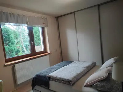 Łóżko lub łóżka w pokoju w obiekcie Marlove Apartment Wrocław