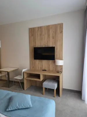 Telewizja i/lub zestaw kina domowego w obiekcie Aparthotel Apartamenty Czarna Góra 110