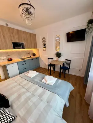 Łóżko lub łóżka w pokoju w obiekcie Dan Apartament C, Self check-in