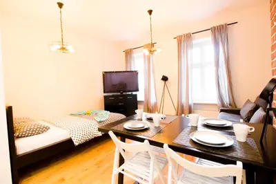 Telewizja i/lub zestaw kina domowego w obiekcie HAPPYESTATE -ul ŁACIARSKA 31