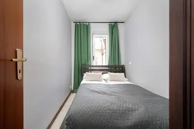 Łóżko lub łóżka w pokoju w obiekcie Atmospheric 2-Bedroom Apartment Near the Market Square by Noclegi Renters