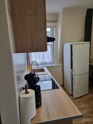 Kuchnia lub aneks kuchenny w obiekcie Apartament 5- Bliżej Zdroju