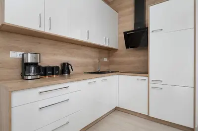 Kuchnia lub aneks kuchenny w obiekcie Stylish Apartment Located in the Old Town Close to Attractions by Noclegi Renters