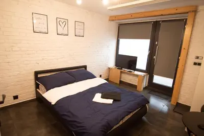 Łóżko lub łóżka w pokoju w obiekcie Dream Loft
