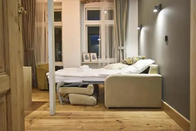 Łóżko lub łóżka w pokoju w obiekcie Comfort & Modern Apartment Studio by Market Square with AC AS HOME S4
