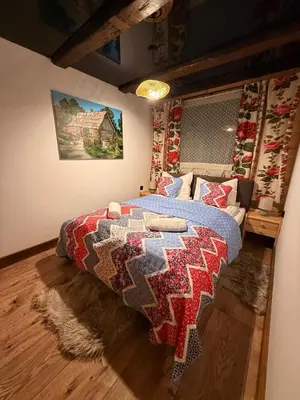 Łóżko lub łóżka w pokoju w obiekcie Leśna 6