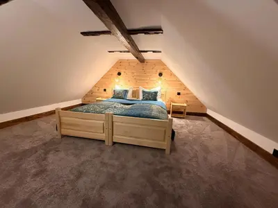Łóżko lub łóżka w pokoju w obiekcie Leśna 6