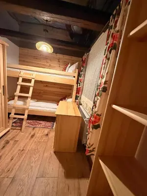 Łóżko lub łóżka w pokoju w obiekcie Leśna 6
