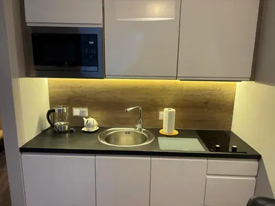 Kuchnia lub aneks kuchenny w obiekcie OVO Apartament 448