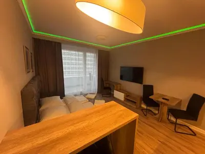 Telewizja i/lub zestaw kina domowego w obiekcie OVO Apartament 448