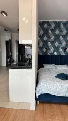 Łóżko lub łóżka w pokoju w obiekcie Apartament z balkonem Jaworska