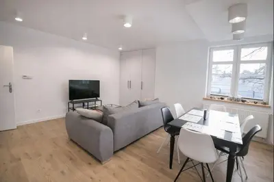 Telewizja i/lub zestaw kina domowego w obiekcie Apartament Warszawska 11