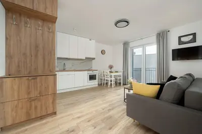 Kuchnia lub aneks kuchenny w obiekcie Cosy Apartment with Balcony by Noclegi Renters