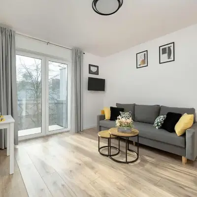 Cosy Apartment with Balcony by Noclegi Renters