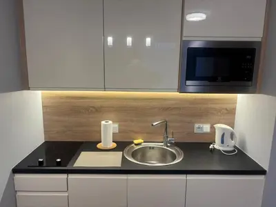 Kuchnia lub aneks kuchenny w obiekcie OVO Apartament 466