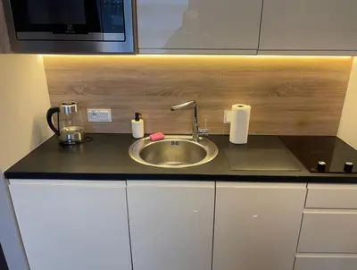 Kuchnia lub aneks kuchenny w obiekcie OVO Apartament 556