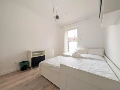 Łóżko lub łóżka w pokoju w obiekcie Jesionowa Spacious Apartment by BookingHost